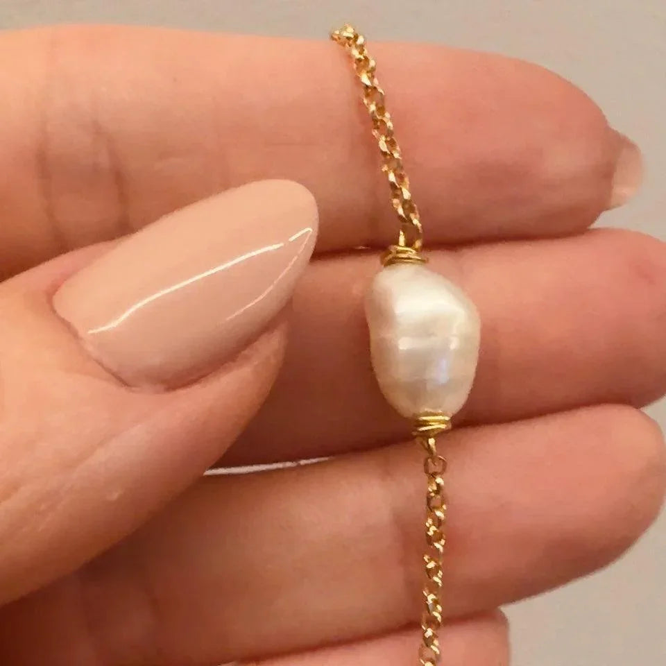 Pulseira Suspensa Ubomi Pérola Barroca