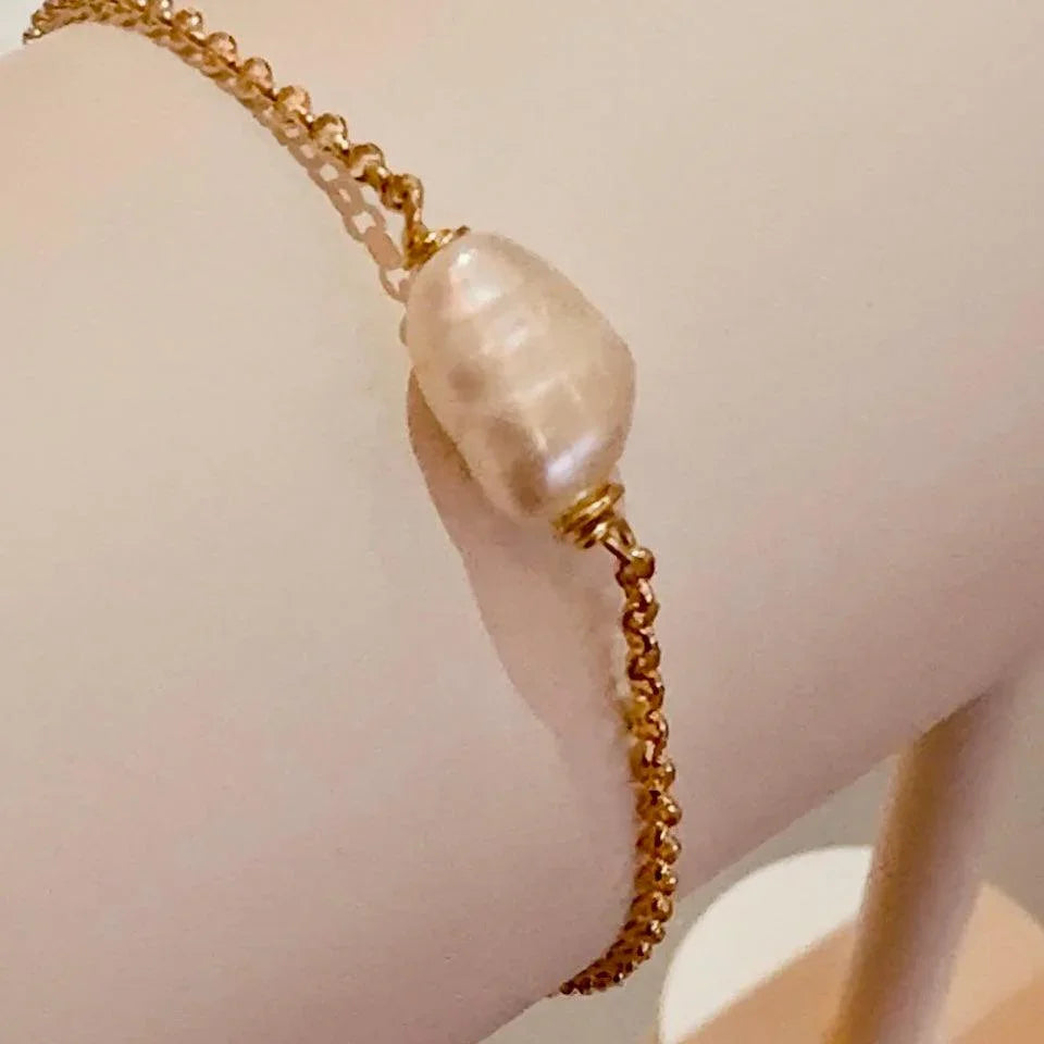 Pulseira Suspensa Ubomi Pérola Barroca